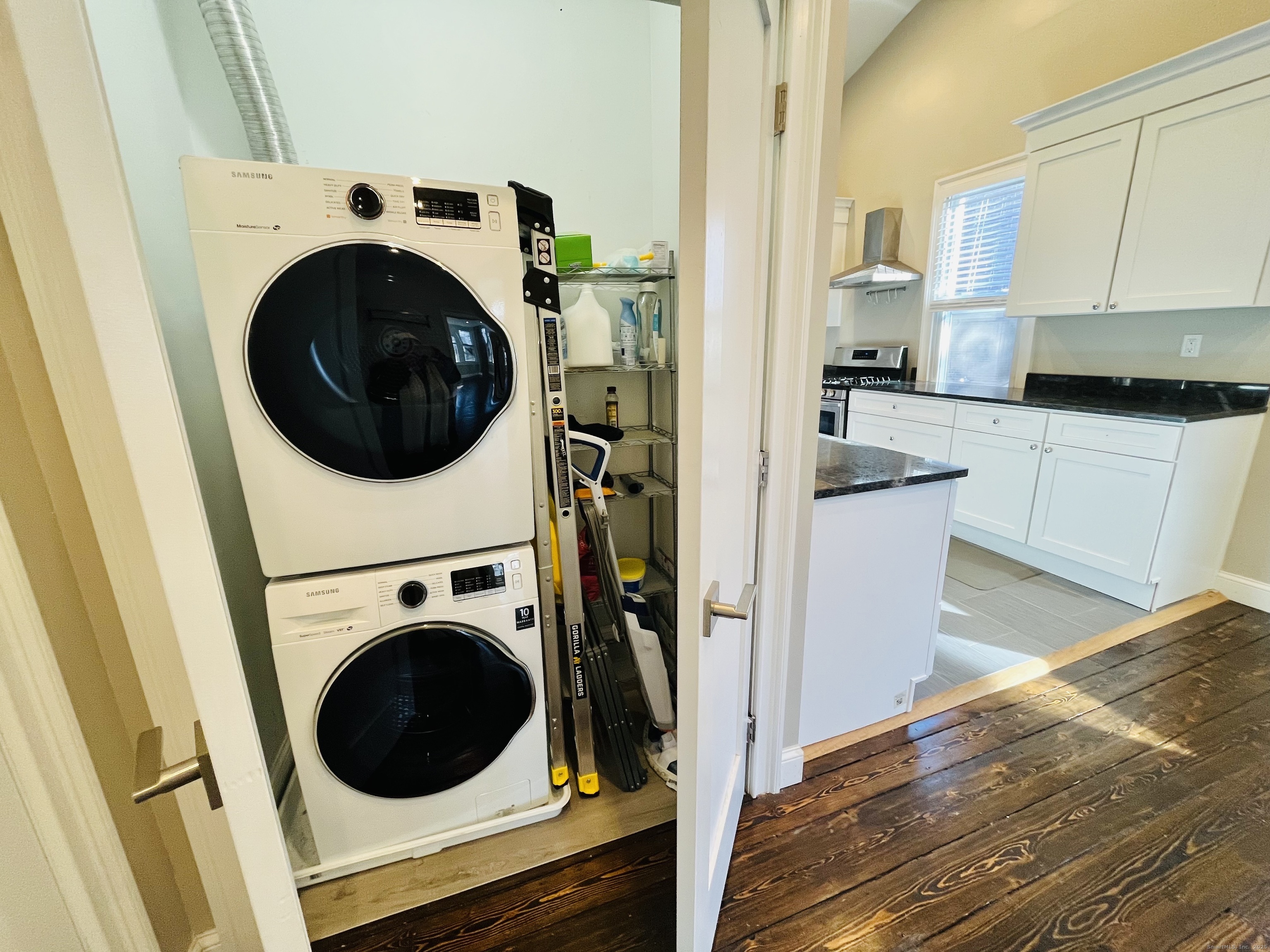 597 Chapel Street, Unit 2FR New Haven, CT 06511 - Photo 5 of 15 a view of a kitchen with washer and dryer