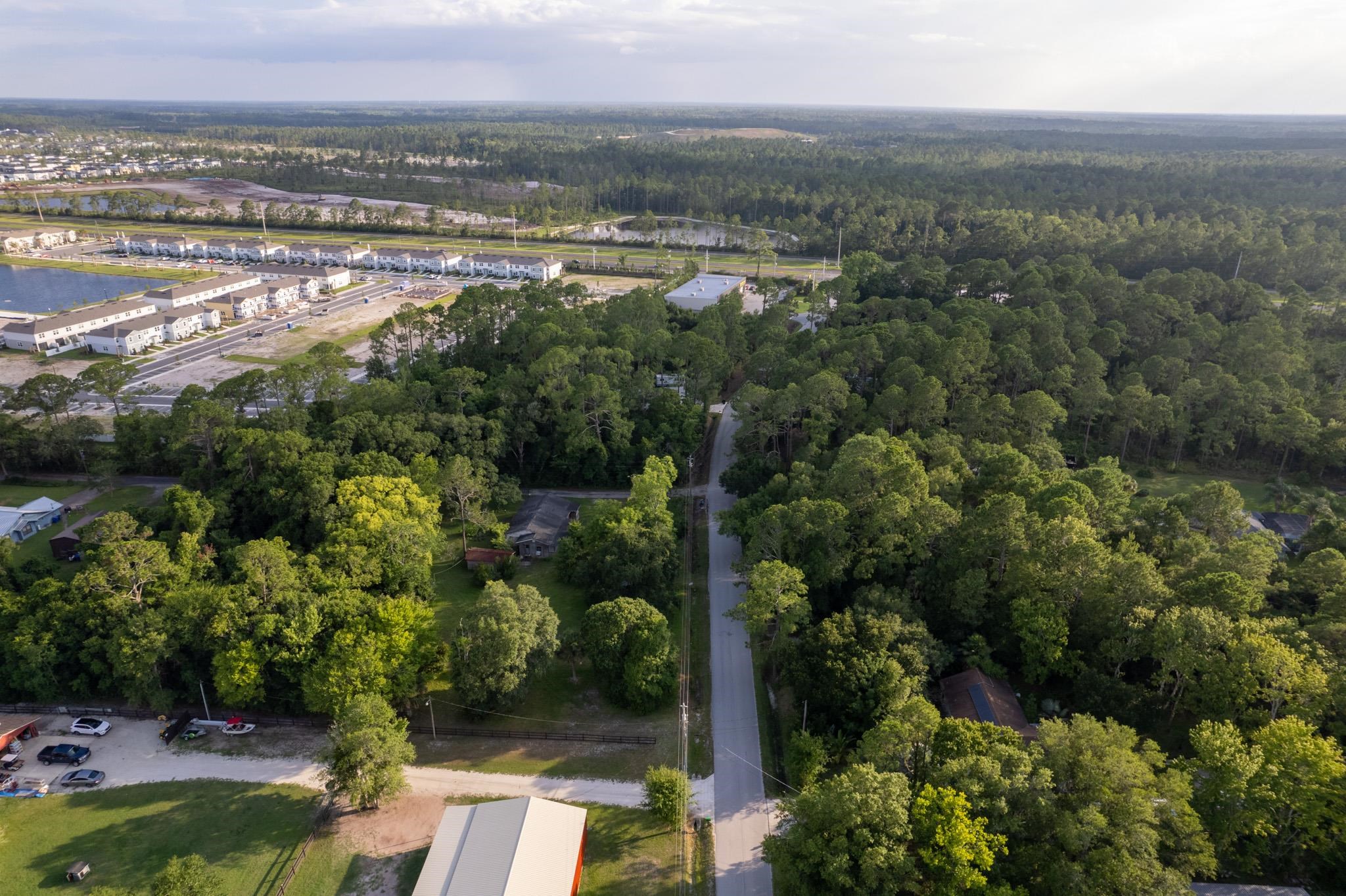 161 Stokes Landing Road St. Augustine, FL 32095 - Photo 5 of 15 a view of a city with lush green forest