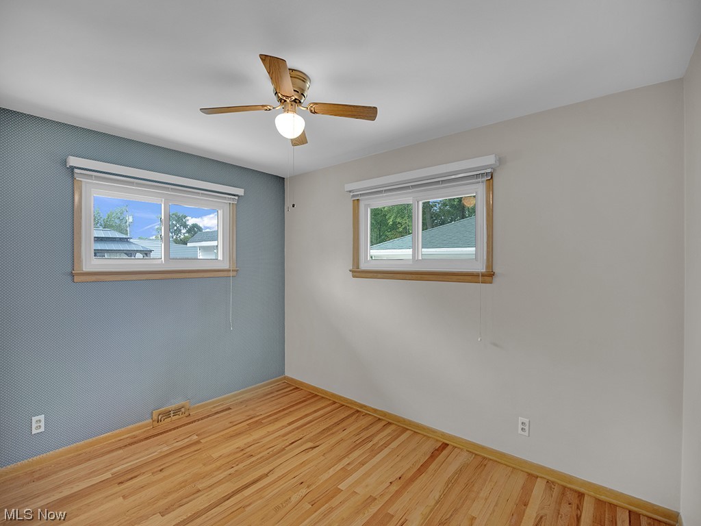 1246 Elmwood Road Cleveland, OH 44124 - Photo 14 of 26 Bedroom with wood floors . Refinished