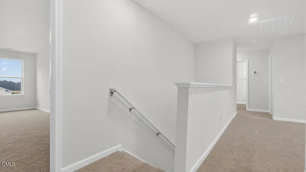 a bathroom with a toilet and a bathtub