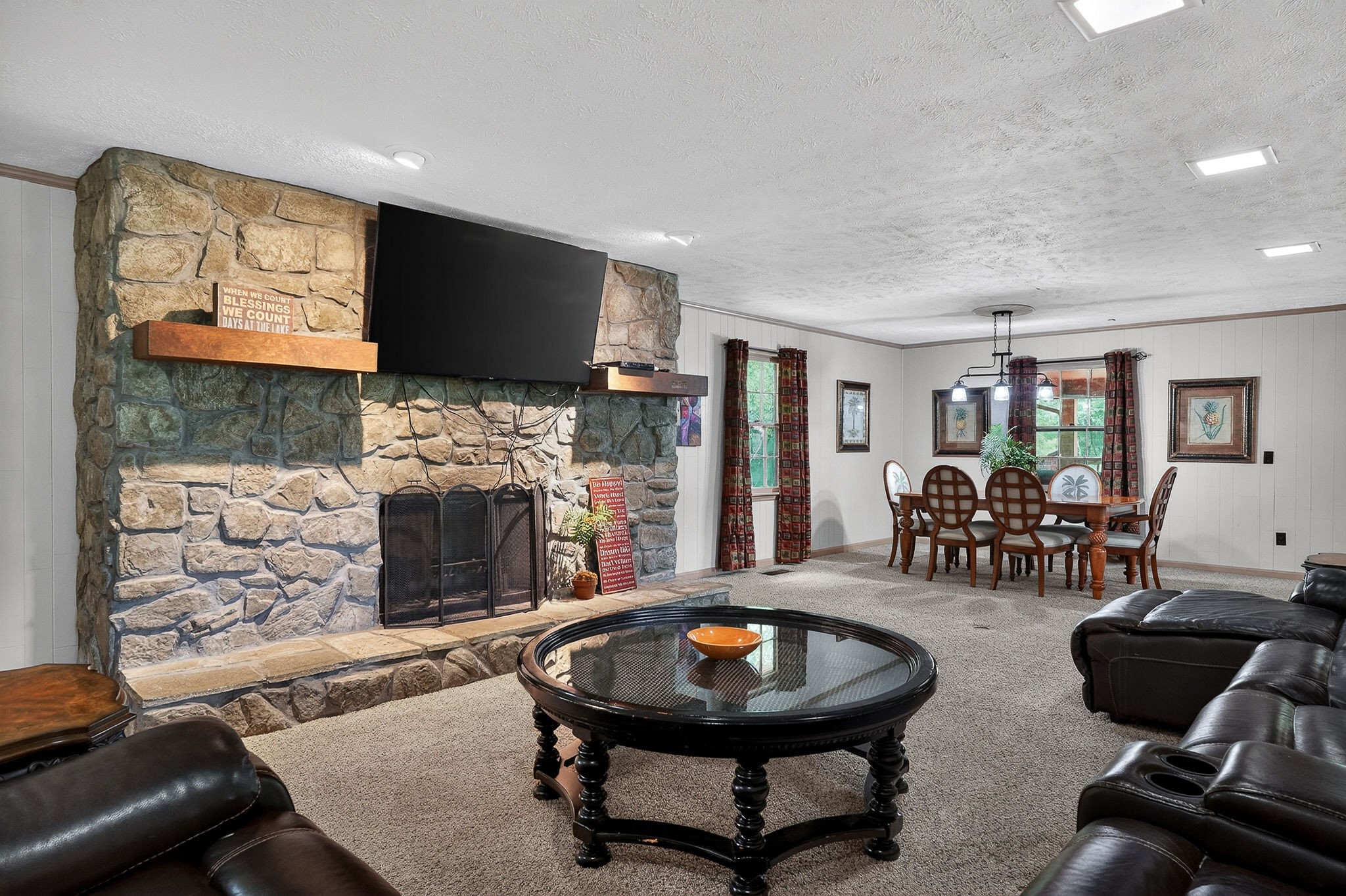 5642 Pates Ford Road Smithville, TN 37166 - Photo 4 of 32 a living room with furniture and a flat screen tv