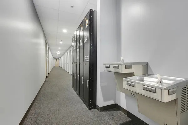 a view of a hallway with washer and dryer