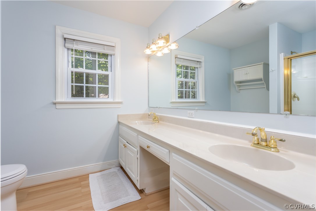 3904 Timber Ridge Place Midlothian, VA 23112 - Photo 19 of 35 Master bathroom with double sinks, shower and lami