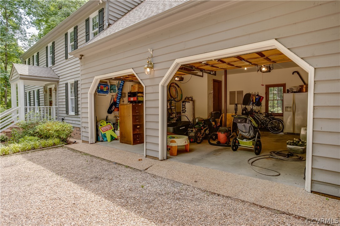3904 Timber Ridge Place Midlothian, VA 23112 - Photo 27 of 35 Extra wide two-car garage with extra space for you