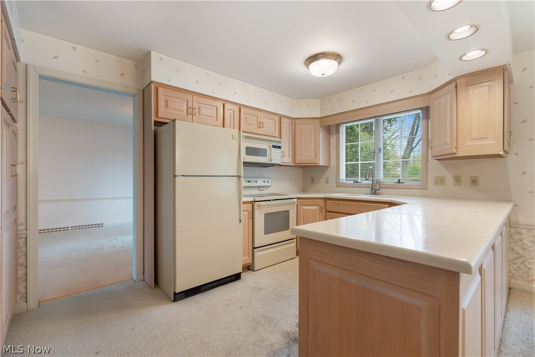 2240 Devonshire Road Northwest Canton, OH 44708 - Photo 8 of 36 Off the dining room is an eat in kitchen.