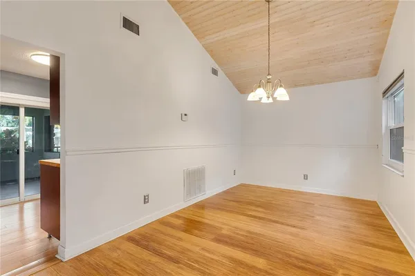 a view of a room with a large window