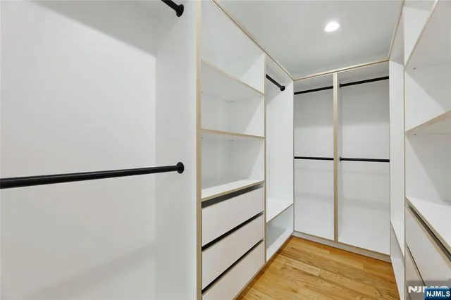 a view of an empty walk in closet
