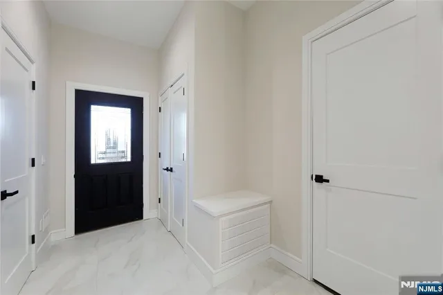 a bathroom with a tub and shower