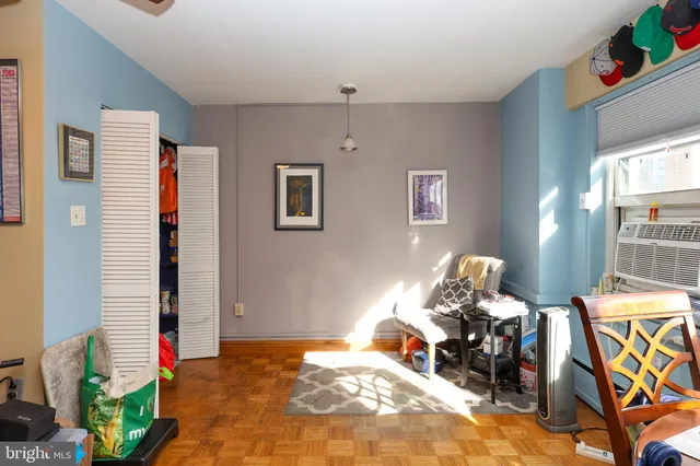 a bedroom with furniture and a bed