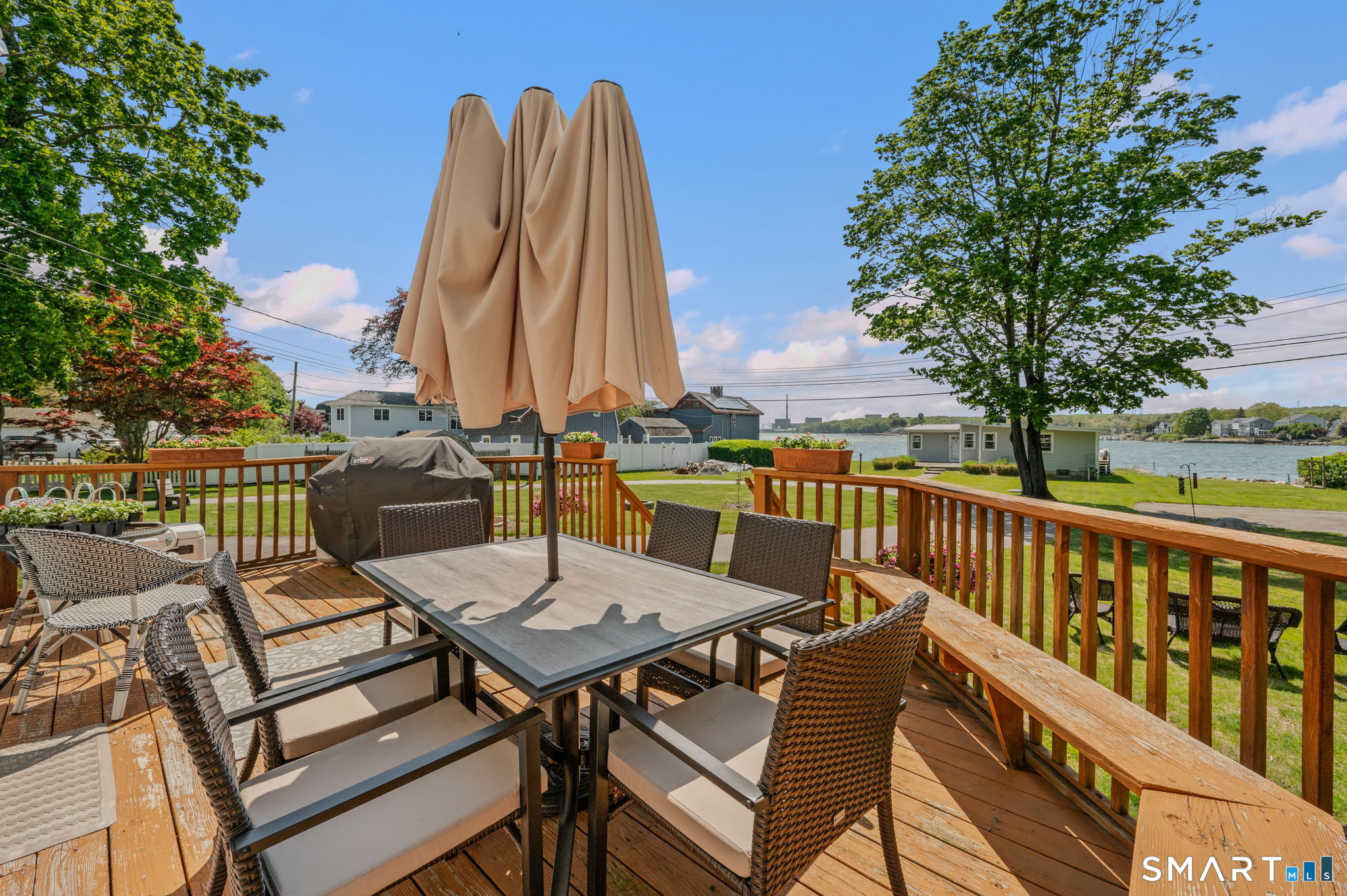 212 R Shore Road Waterford, CT 06385 - Photo 28 of 28 a view of a chairs and table in the balcony