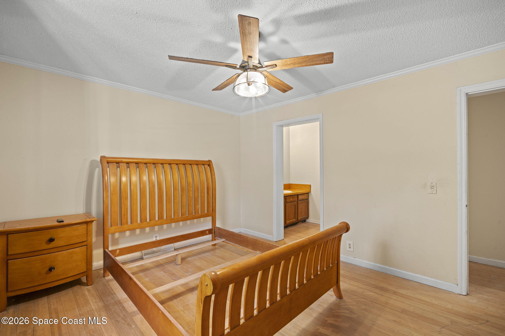 325 East Hall Road Merritt Island, FL 32953 - Photo 15 of 29 a view of a hallway with entryway wooden floor and front door