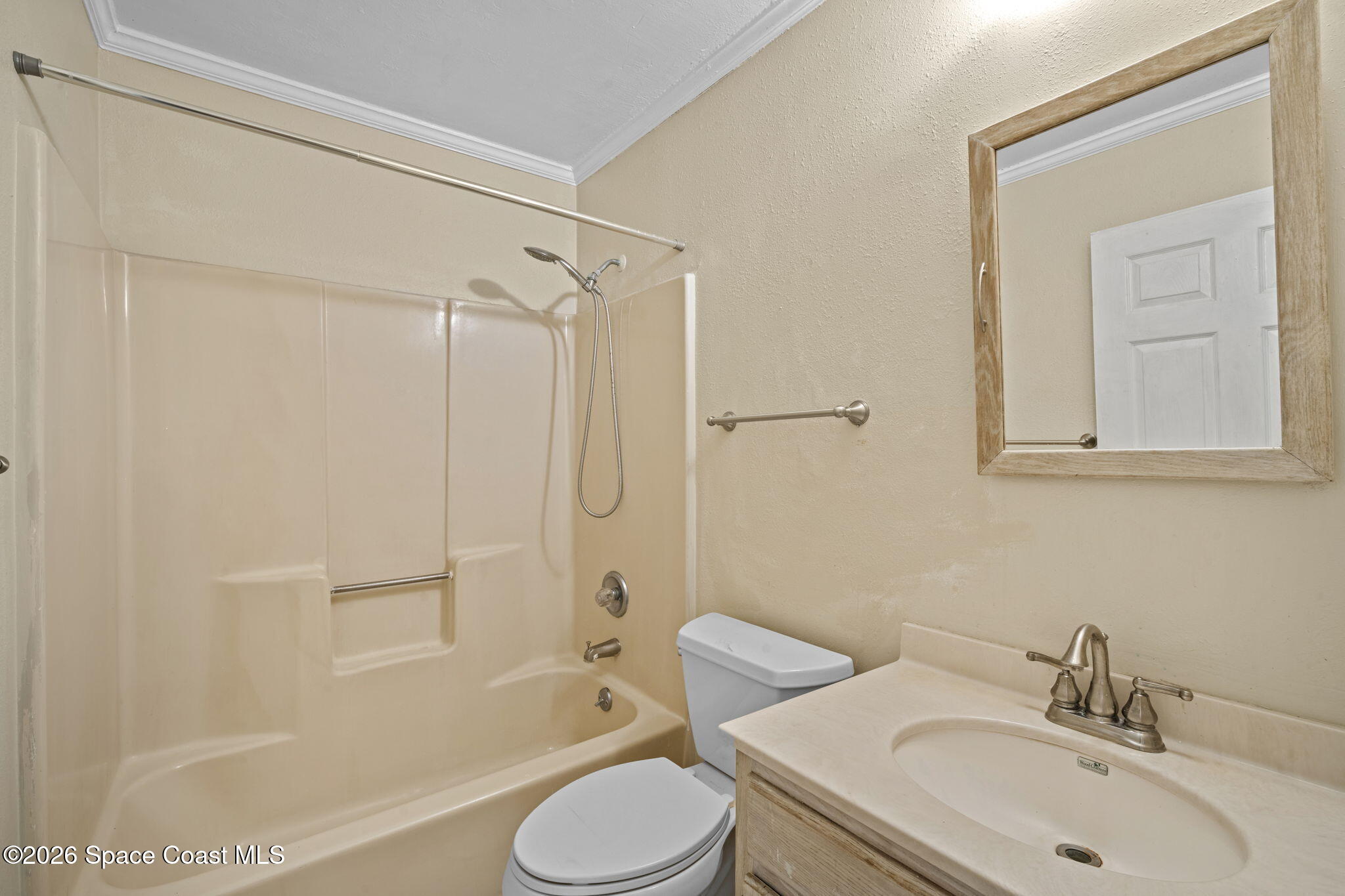 325 East Hall Road Merritt Island, FL 32953 - Photo 22 of 29 a bathroom with a sink toilet and shower