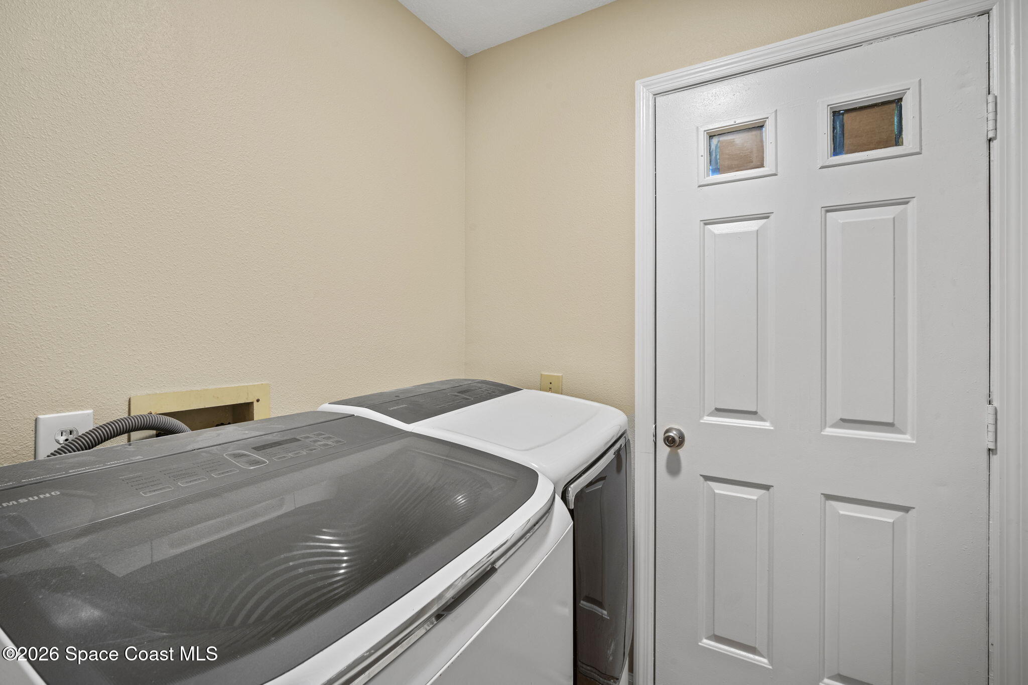 325 East Hall Road Merritt Island, FL 32953 - Photo 23 of 29 a utility room with dryer and washer