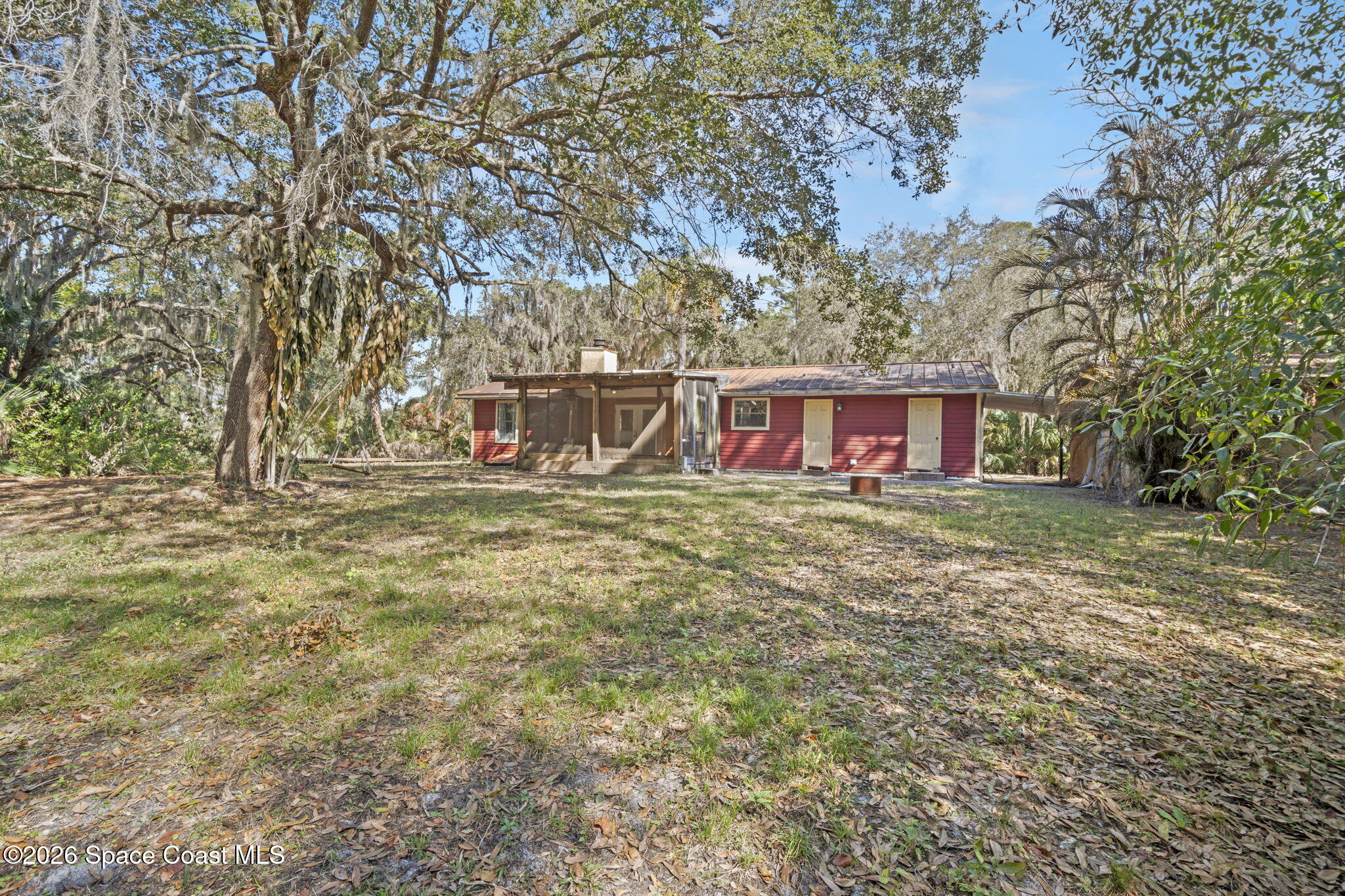 325 East Hall Road Merritt Island, FL 32953 - Photo 26 of 29 a view of house with backyard