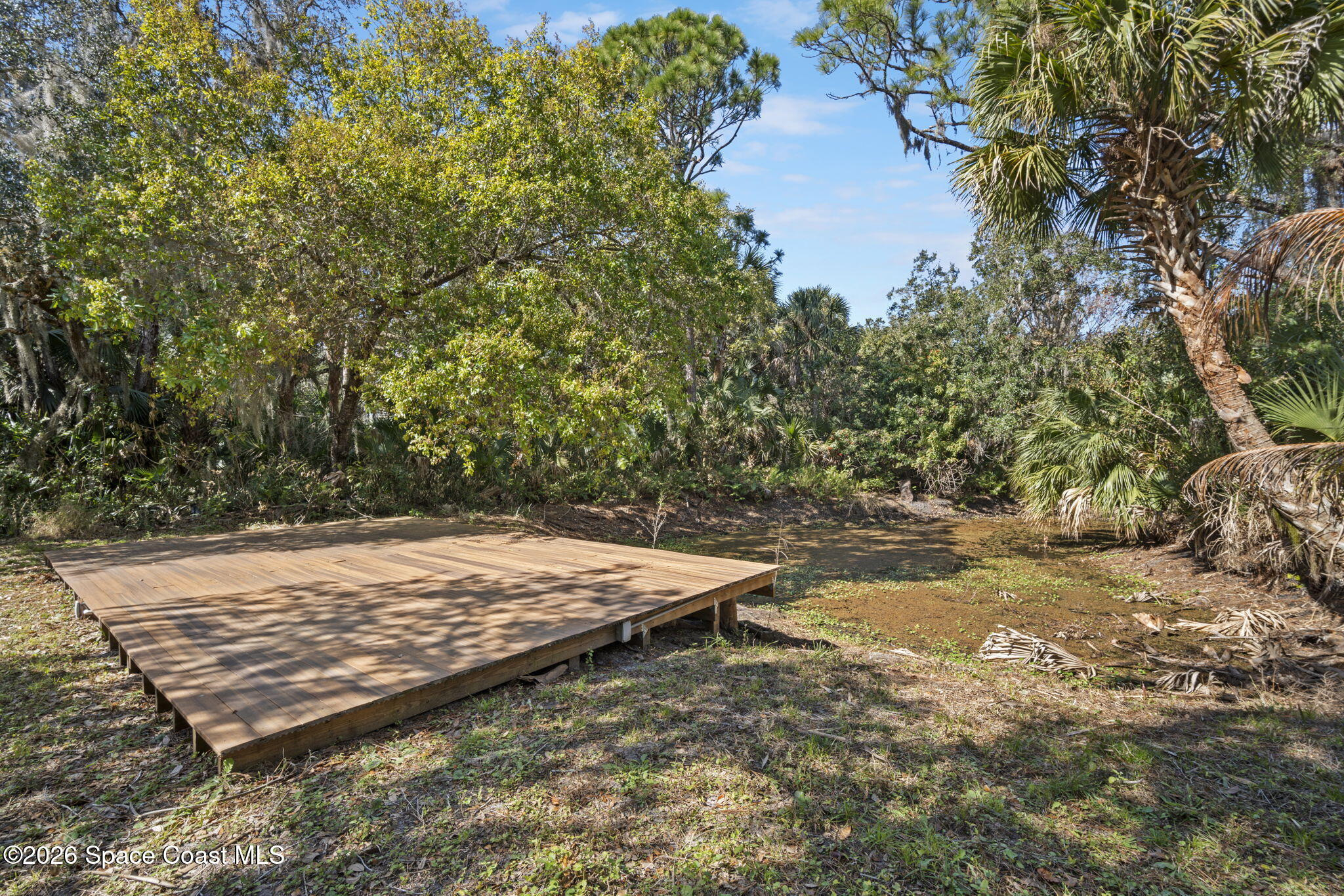 325 East Hall Road Merritt Island, FL 32953 - Photo 27 of 29 a view of a backyard of the house