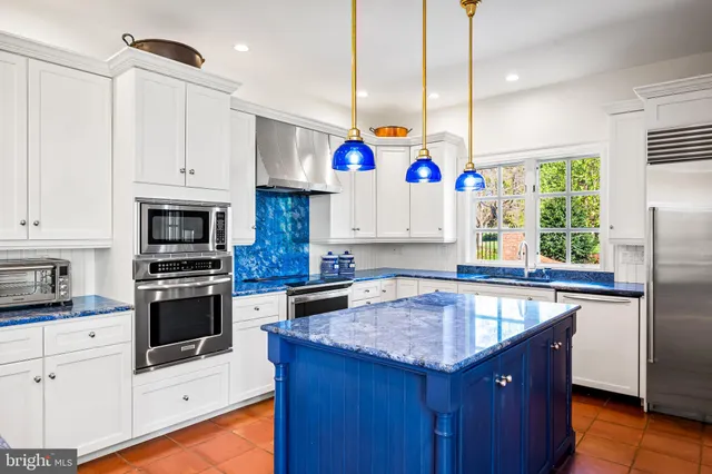 a room with furniture and a book shelf