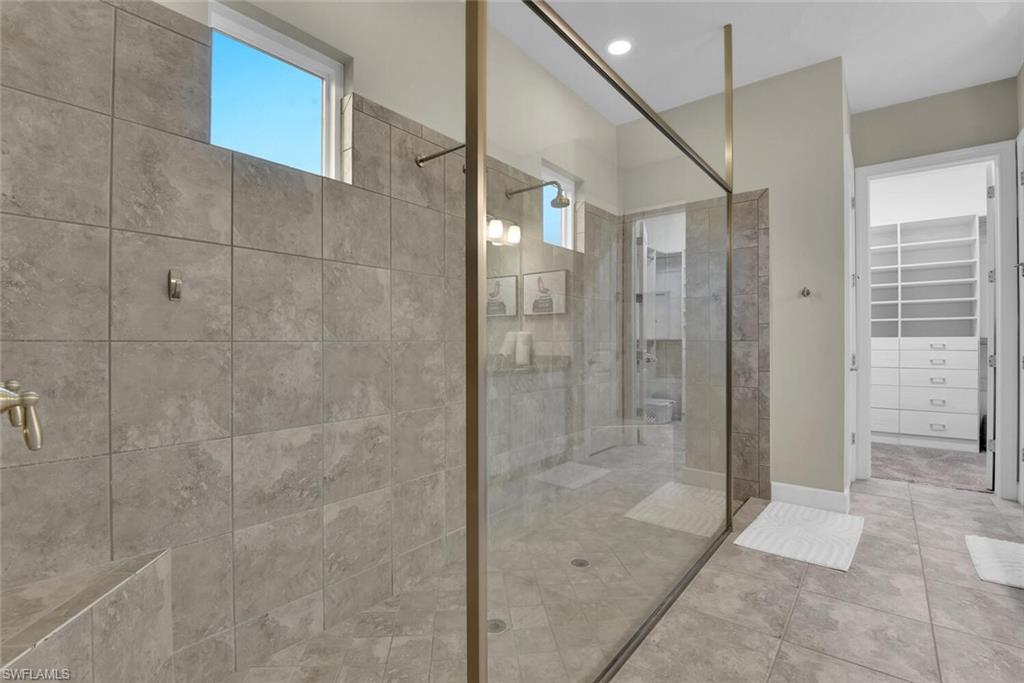 9630 Campanile Circle Naples, FL 34114 - Photo 18 of 31 a bathroom with a shower