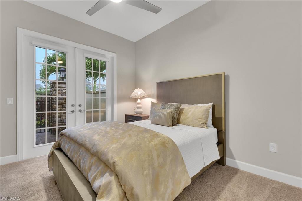 9630 Campanile Circle Naples, FL 34114 - Photo 20 of 31 a bedroom with a large bed and a window
