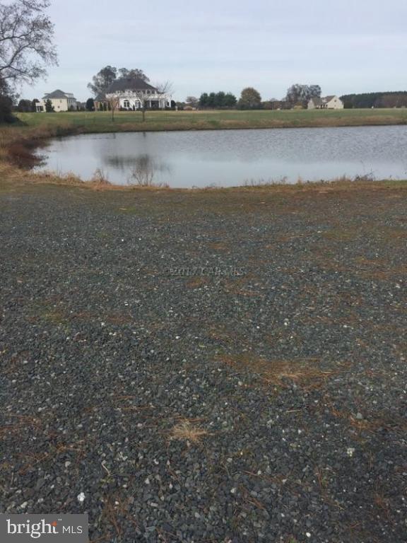 12485 Mallard Landing Road Princess Anne, MD 21853 - Photo 8 of 13 a view of an ocean with a mountain in the background