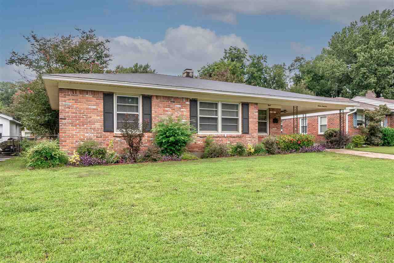 1645 Welsh Road Memphis, TN 38117 - Photo 1 of 18 front view of a house with a yard