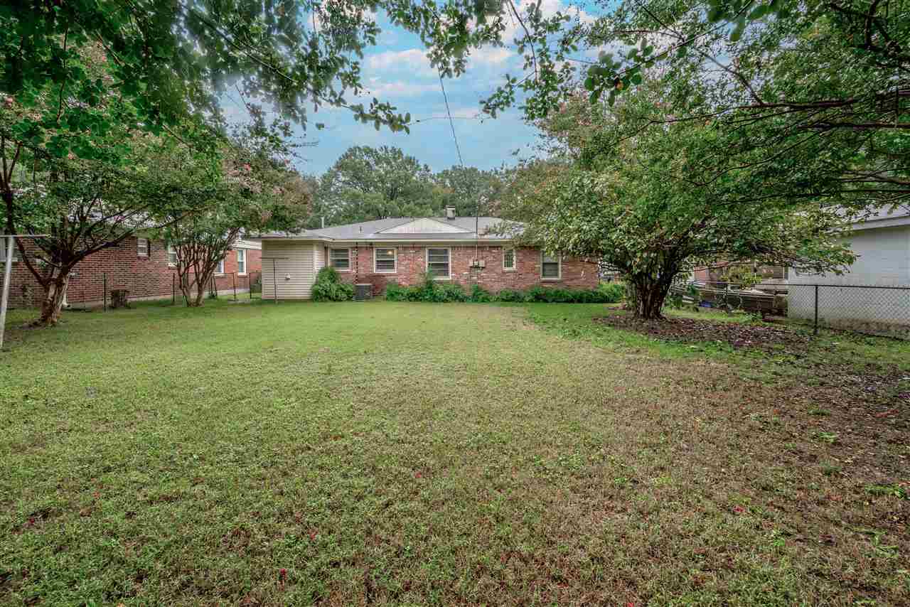 1645 Welsh Road Memphis, TN 38117 - Photo 18 of 18 a view of a house with a yard
