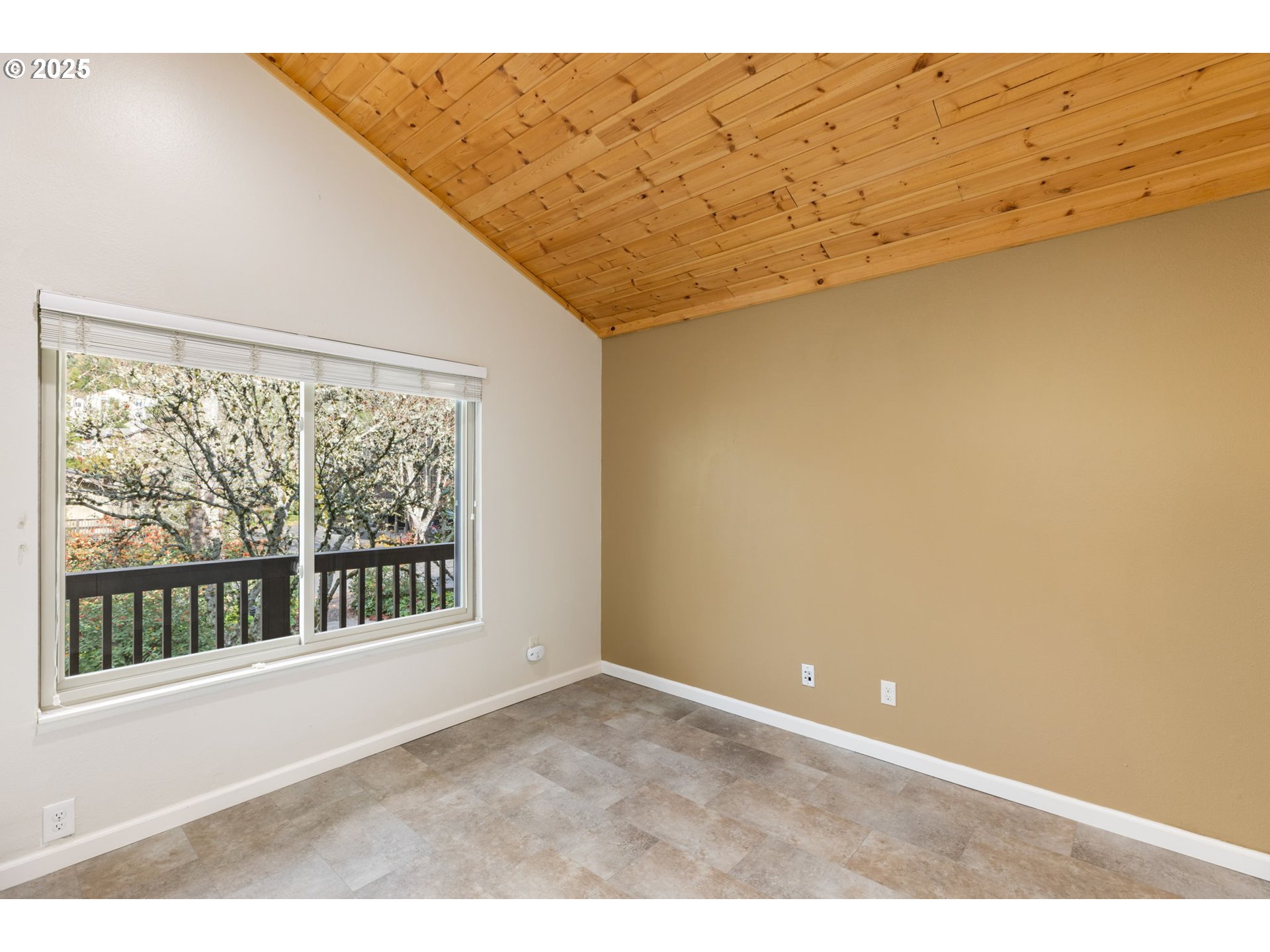 7734 Southwest Barnes Road, Unit A Portland, OR 97225 - Photo 17 of 37 Primary Bedroom