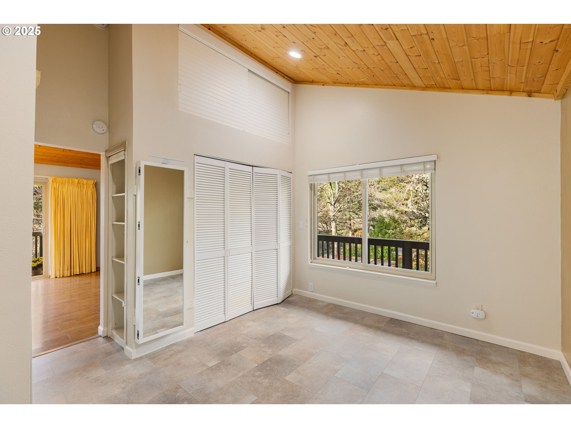7734 Southwest Barnes Road, Unit A Portland, OR 97225 - Photo 18 of 37 Primary Bedroom