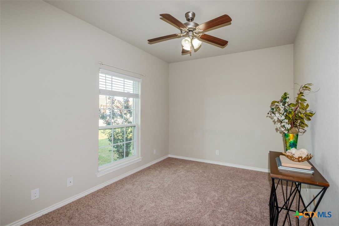 2601 Tarrant County Drive Killeen, TX 76549 - Photo 17 of 35 a view of a workspace with furniture and a window