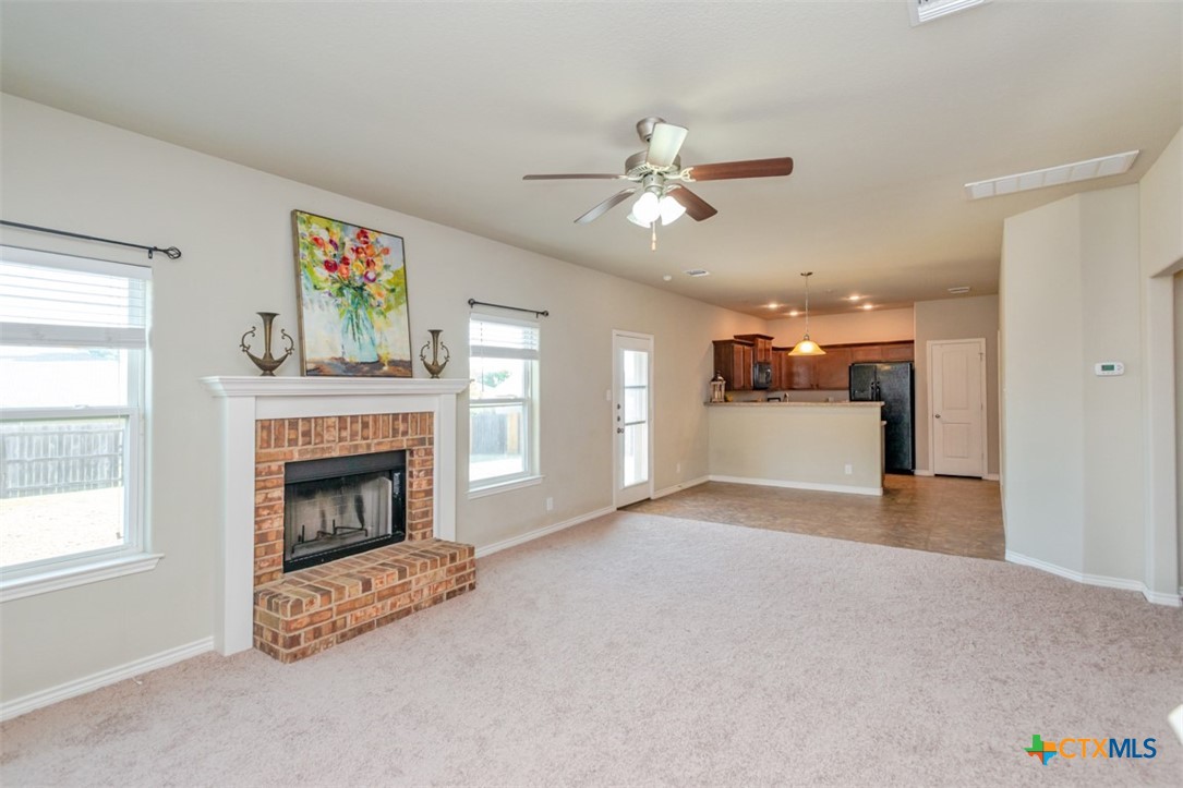 2601 Tarrant County Drive Killeen, TX 76549 - Photo 18 of 35 a view of a livingroom with a fireplace and window