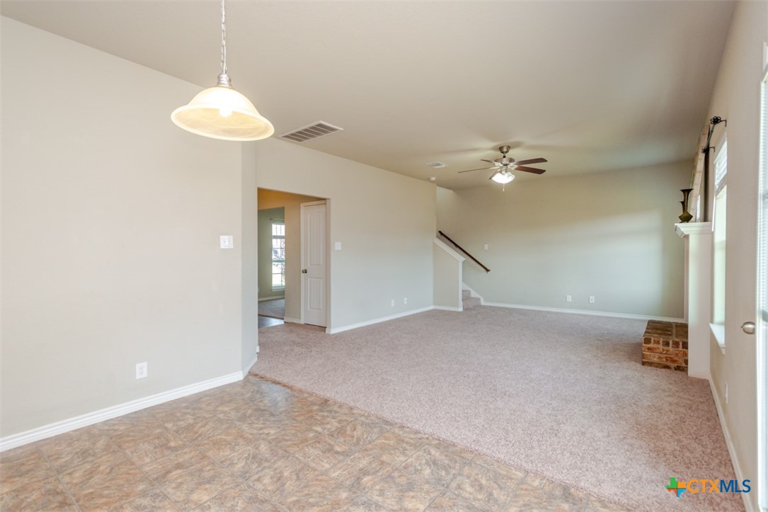 2601 Tarrant County Drive Killeen, TX 76549 - Photo 20 of 35 a view of an empty room with a chandelier fan