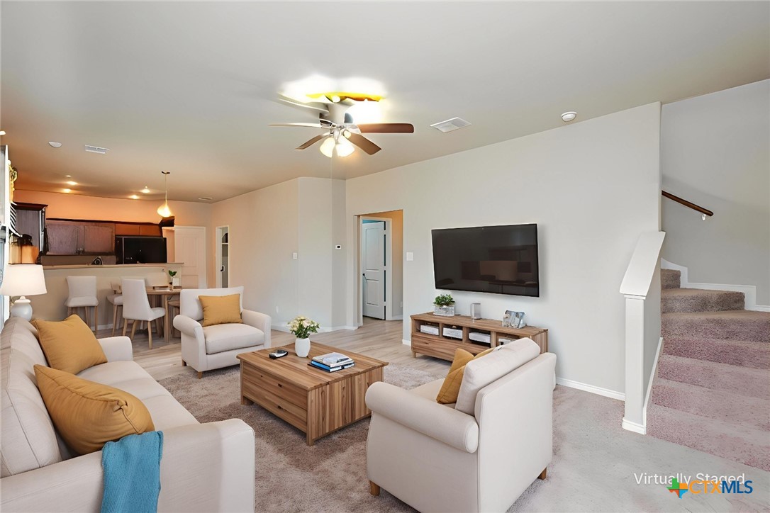 2601 Tarrant County Drive Killeen, TX 76549 - Photo 2 of 35 a living room with furniture and a flat screen tv