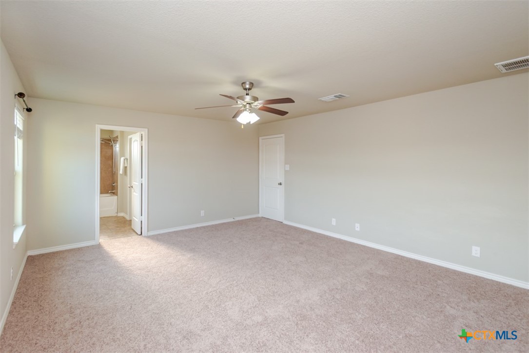 2601 Tarrant County Drive Killeen, TX 76549 - Photo 22 of 35 a view of an empty room with a ceiling fan