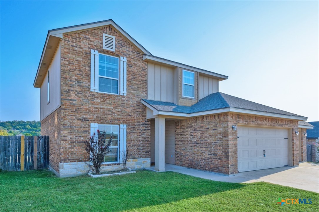 2601 Tarrant County Drive Killeen, TX 76549 - Photo 29 of 35 a front view of a house with a garden