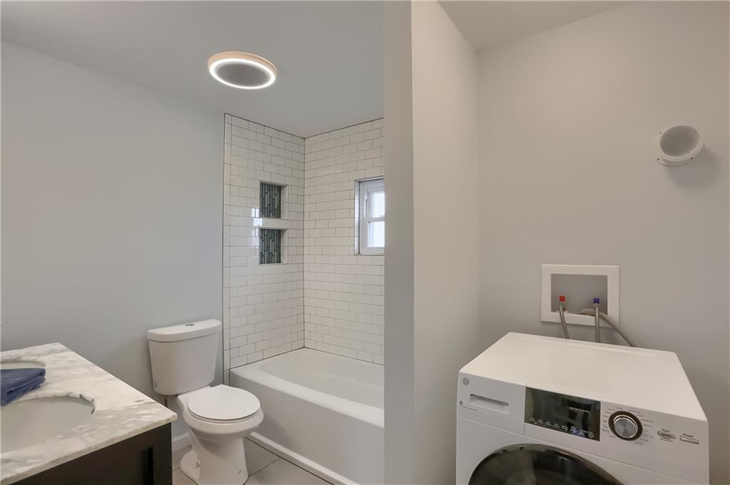 96 Ridgewood Avenue Pittsburgh, PA 15229 - Photo 21 of 41 Main bathroom and washer/dryer unit. Great for upstairs convenience. Additional laundry area available in the basement