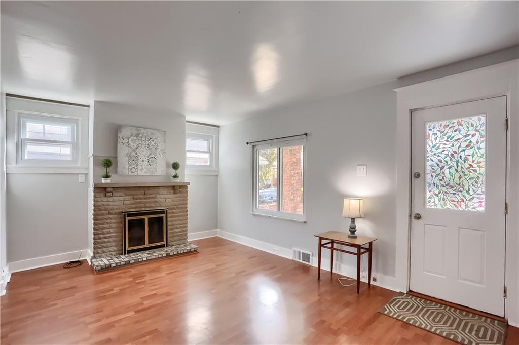 Living room with decorative fireplace