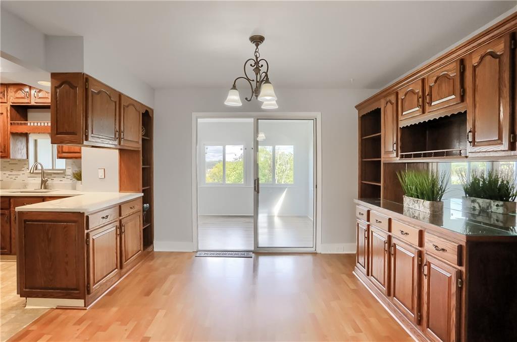 96 Ridgewood Avenue Pittsburgh, PA 15229 - Photo 9 of 41 Dining room with built in cabinets looking thourgh doors to the family room
