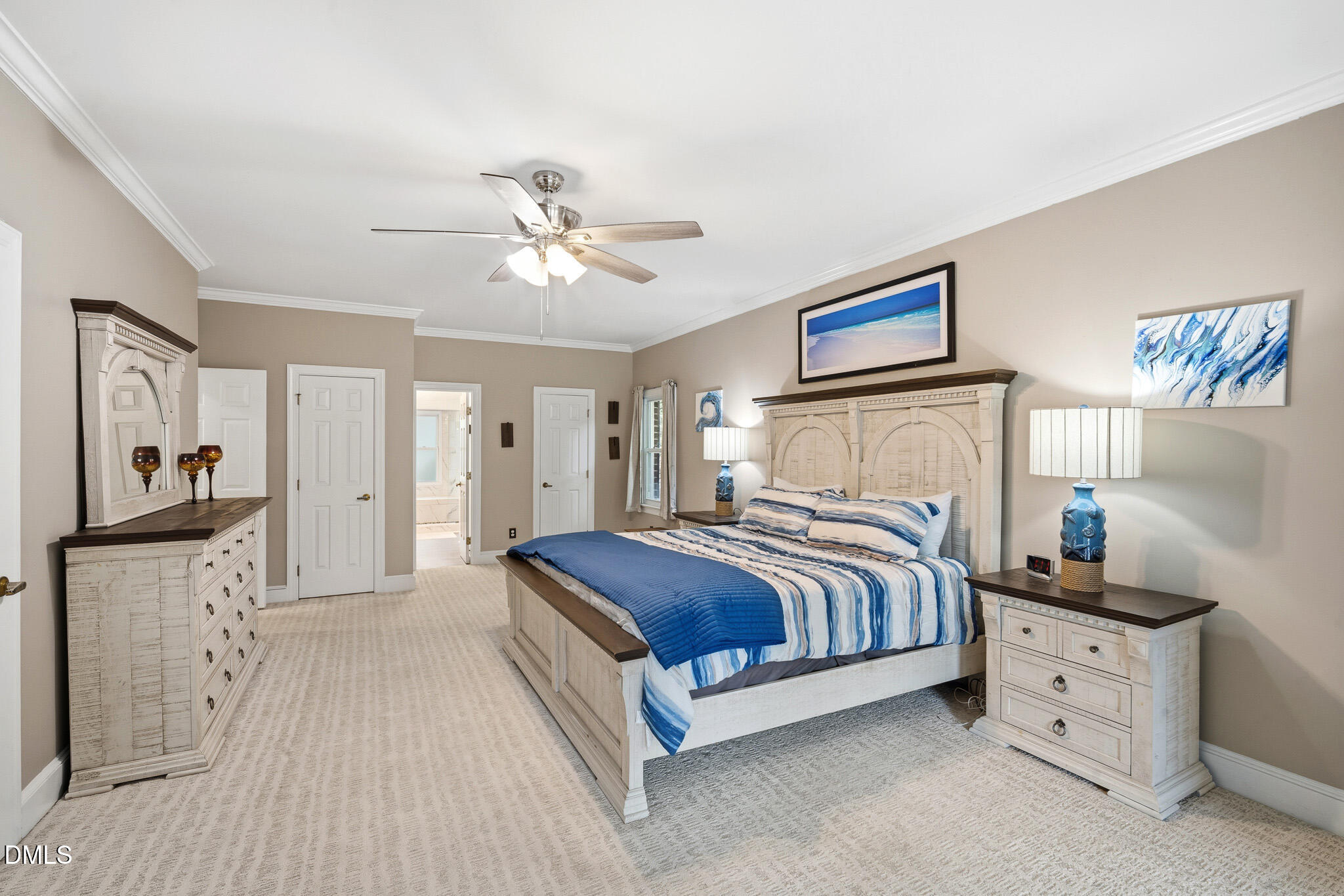 3735 Stoneybrook Drive Durham, NC 27705 - Photo 22 of 44 a spacious bedroom with a bed and a chandelier