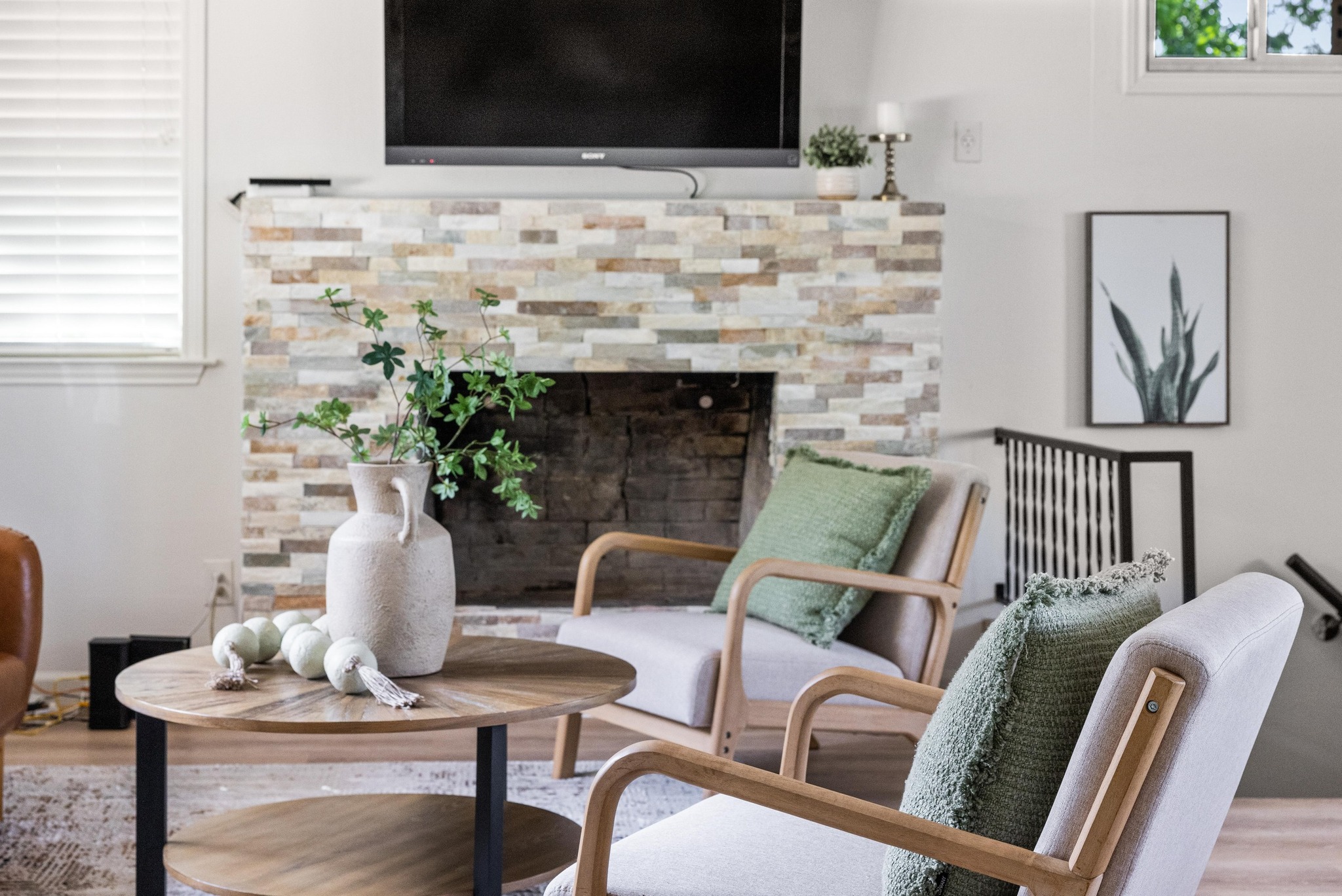 13566 Bullick Hollow Road Austin, TX 78726 - Photo 6 of 32 a living room with furniture and a fireplace