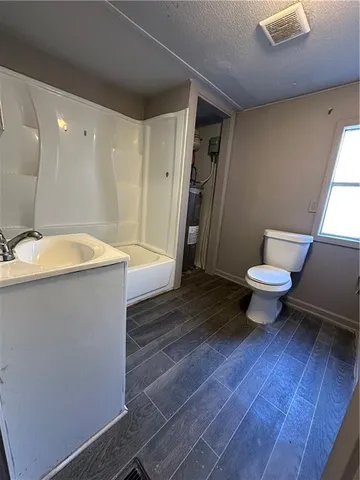 a bathroom with a sink and a toilet