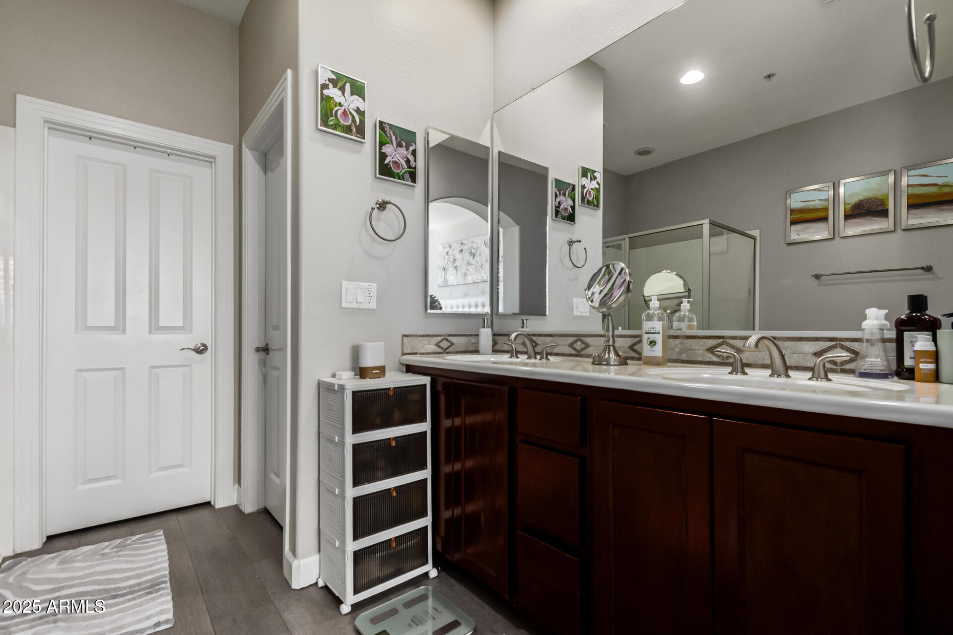 4777 South Fulton Ranch Boulevard, Unit 2035 Chandler, AZ 85248 - Photo 19 of 38 a bathroom with a double vanity sink and a mirror
