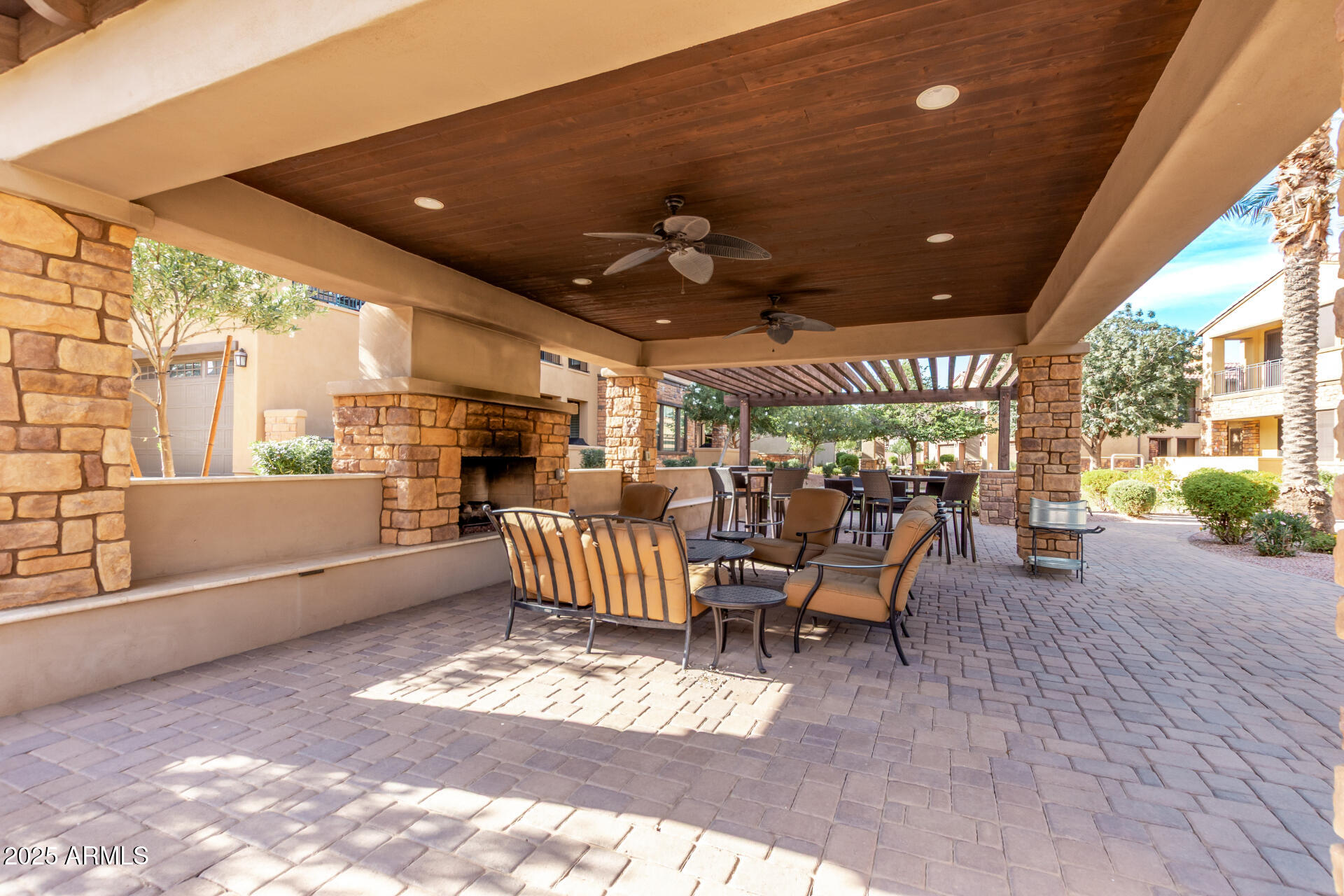 4777 South Fulton Ranch Boulevard, Unit 2035 Chandler, AZ 85248 - Photo 32 of 38 a outdoor space with a large window and chandelier