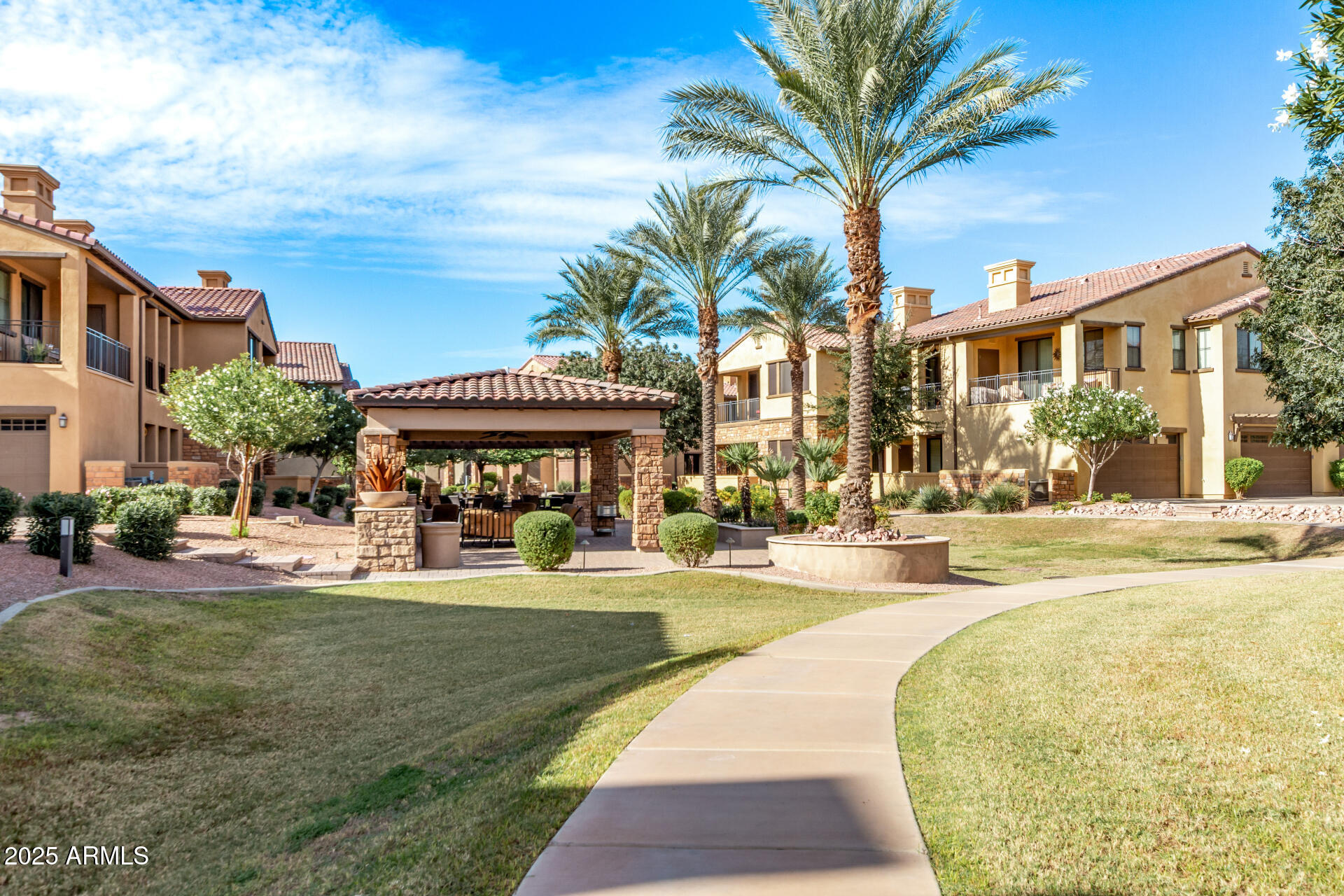 4777 South Fulton Ranch Boulevard, Unit 2035 Chandler, AZ 85248 - Photo 37 of 38 a view of a swimming pool with an outdoor seating