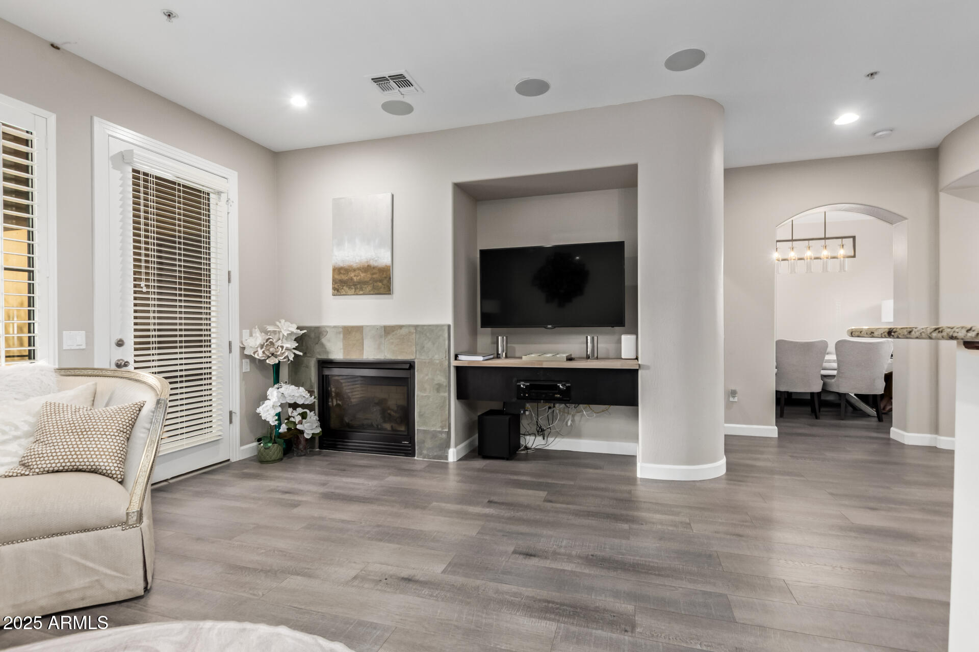 4777 South Fulton Ranch Boulevard, Unit 2035 Chandler, AZ 85248 - Photo 6 of 38 a living room with furniture and a flat screen tv
