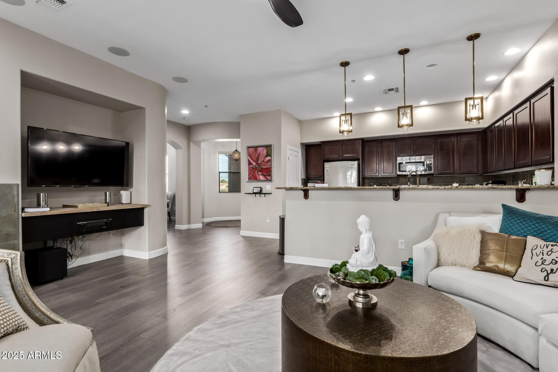 4777 South Fulton Ranch Boulevard, Unit 2035 Chandler, AZ 85248 - Photo 7 of 38 a living room with furniture and a flat screen tv