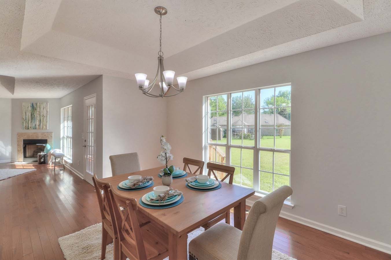 2891 Sulphur Springs Road Murfreesboro, TN 37129 - Photo 11 of 31 a view of a dining room with furniture wooden floor and chandelier