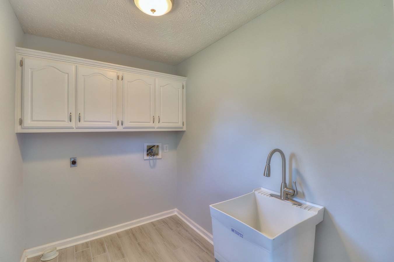 2891 Sulphur Springs Road Murfreesboro, TN 37129 - Photo 18 of 31 a bathroom with a sink and cabinets