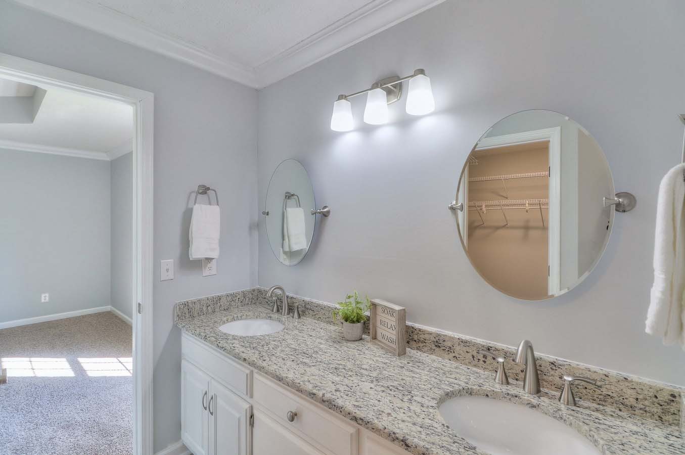 2891 Sulphur Springs Road Murfreesboro, TN 37129 - Photo 24 of 31 a bathroom with a granite countertop double vanity sink and a mirror