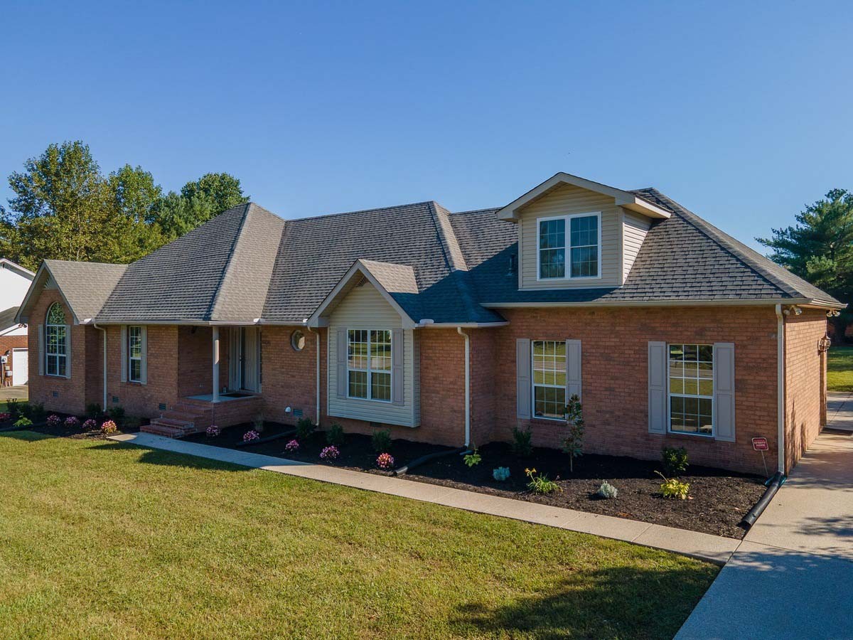 2891 Sulphur Springs Road Murfreesboro, TN 37129 - Photo 3 of 31 a front view of a house with a yard