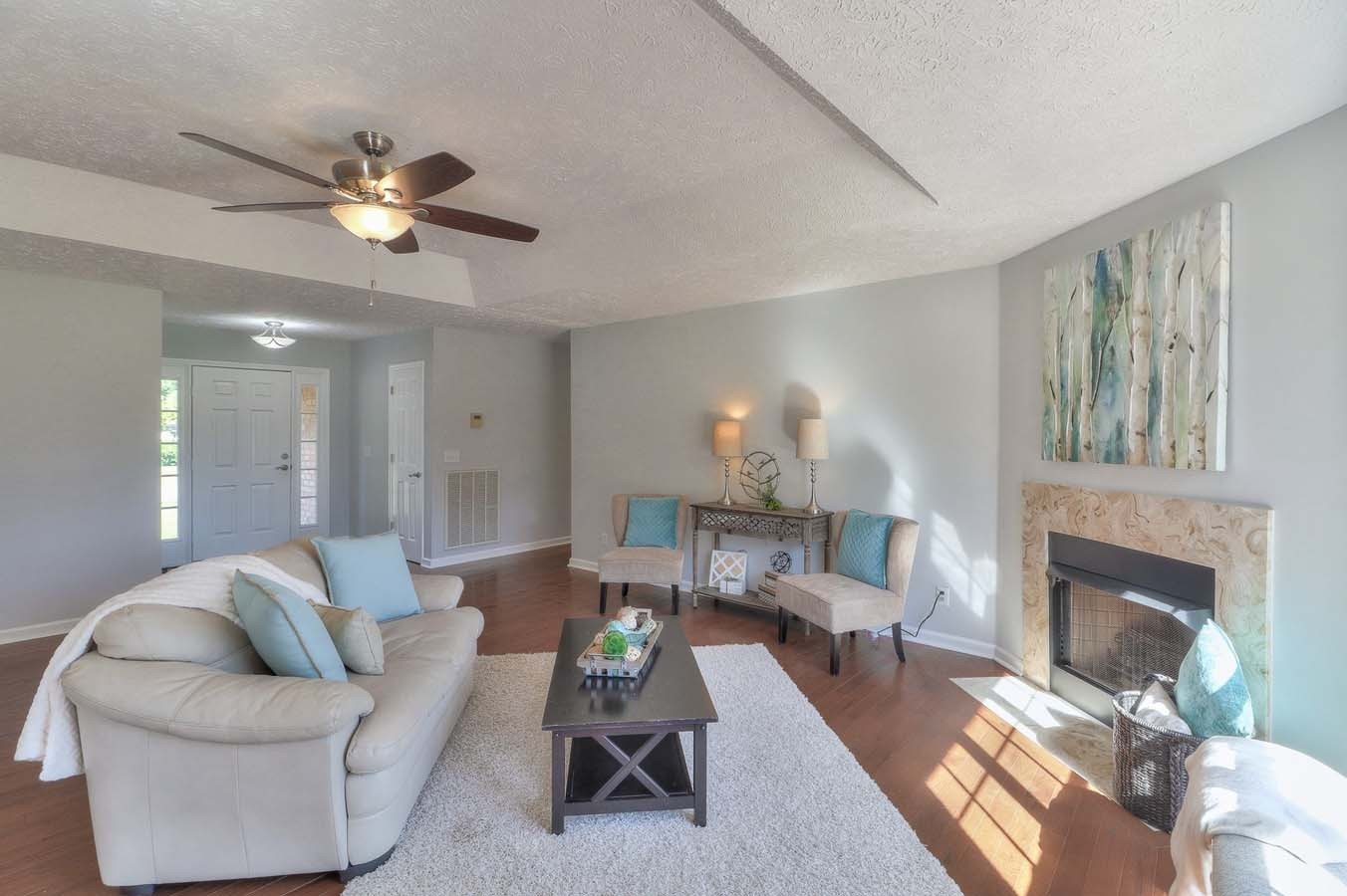 2891 Sulphur Springs Road Murfreesboro, TN 37129 - Photo 7 of 31 a living room with furniture fireplace and a fireplace