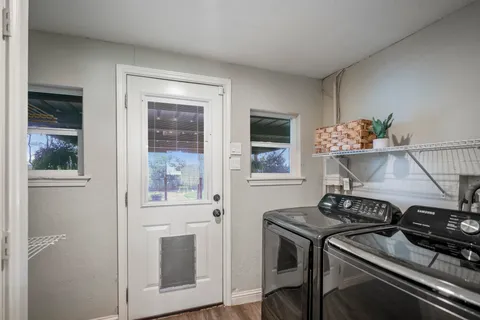 a kitchen with a stove and a microwave